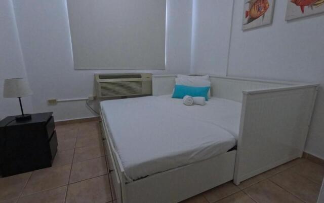 In Joyuda Beach, Apartment with Pool & Basketball Court