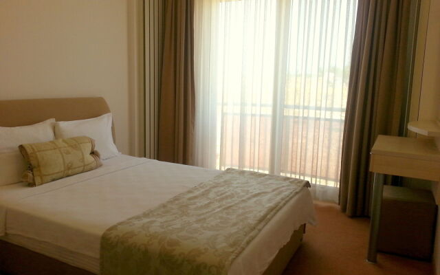 Kamer Suites & Hotel