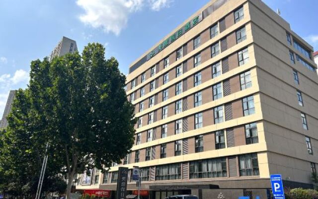 Shiyan Meisheng Holiday Hotel (Shanghai Road University Town)