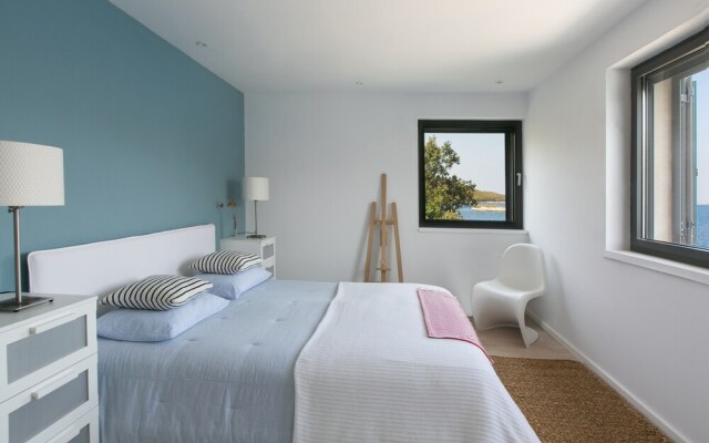 Beachfront Villa Poseidon with Heated Pool