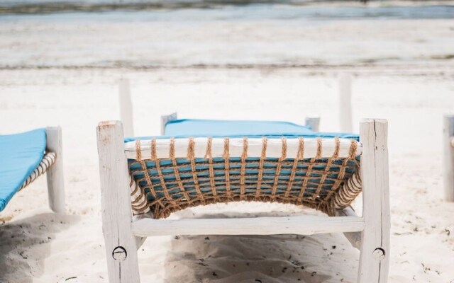 Neema Barefoot Beach House