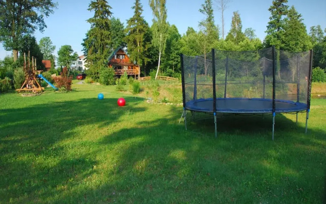 Rustic Riverside Cabin in Forest
