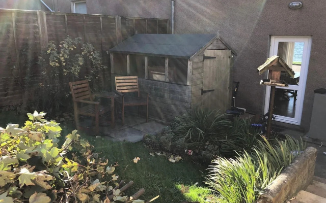 Petfriendly-beachfront-sunsetfacingsunporch-garden