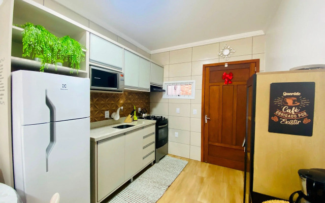 Aconchego e Economia- Lareira, Ar Condicionado, WI Fi, Espaço Gourmet