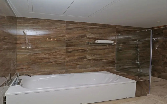 C Pearls Hotel  Banque by OYO Rooms