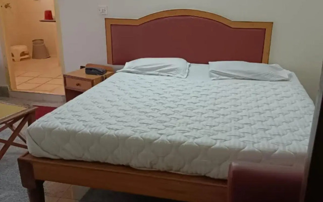 Spot On 808263 Hotel Karunadu Mysore