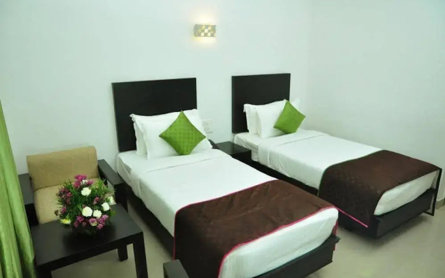 OYO Premium Calicut Airport Extension