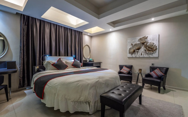 Collection O 14 Sun Boutique Hotel