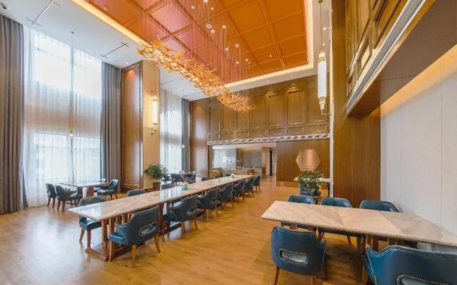 Rezen Heyi Hotel Yizhang