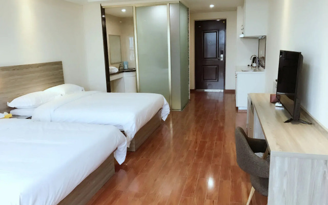 Xingyue Apartment Luogang Wanda