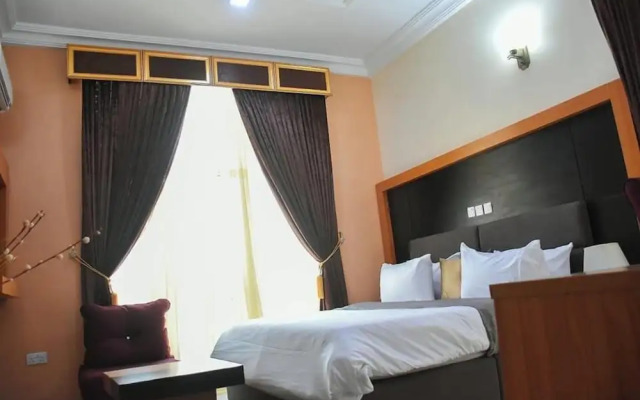 G- throne Hotel and Suites