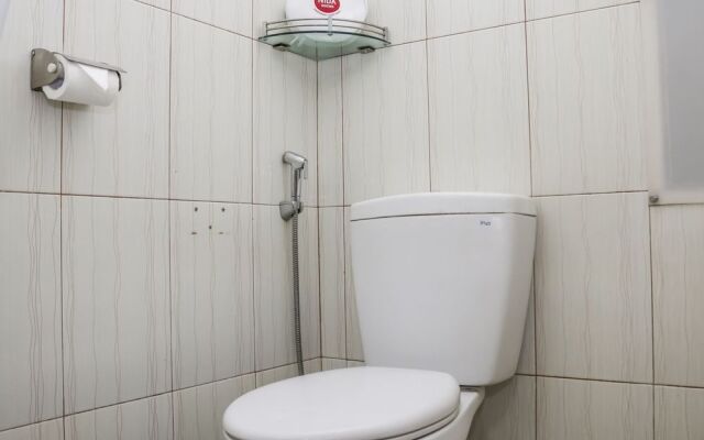 Ten House Guest & Resto by RedDoorz