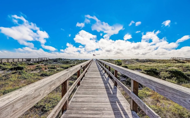 Newly Remodeled Oceanfront Condo with Salt Water Pool and Private Walkway to Beach by RedAwning