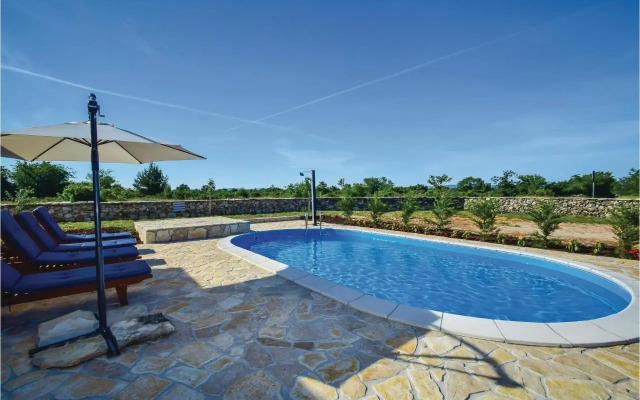 Holiday home Drinovci with a Fireplace 444