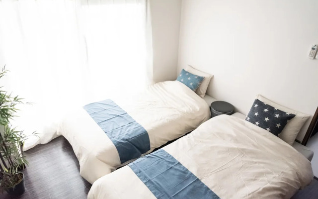 Il Sole Kujo Guest House