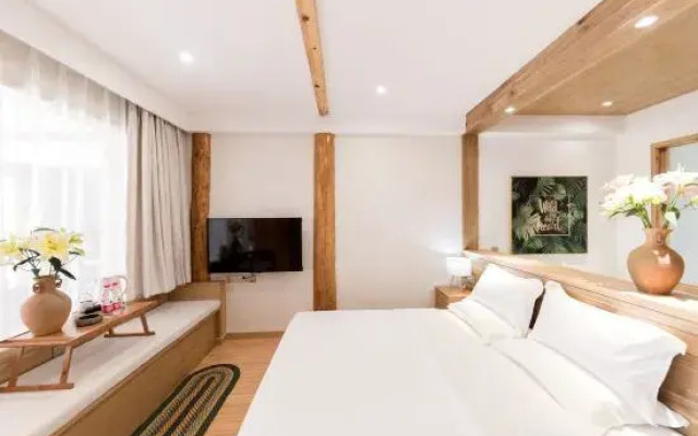 Heart pleasure Yaji Rizhao Jinshan Snow Mountain Scenic Inn (Shuhe Ancient Town Branch)