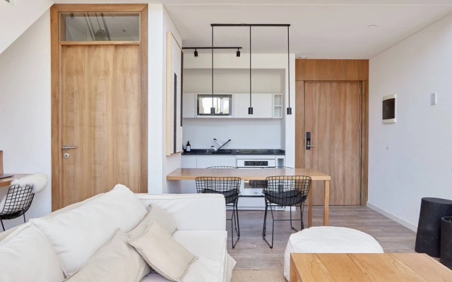 Unique triplex with rooftop private use