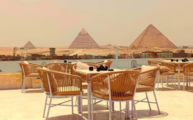 Pyramids sun temple view Inn