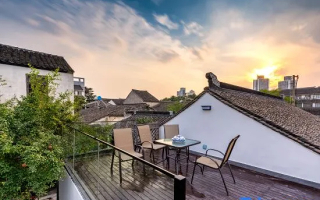 Suzhou larny Holiday Homestay (Guanqian Street Yuxiang Branch)