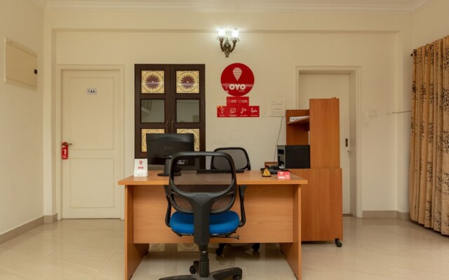 Cute Orange Service Apartments By OYO Rooms