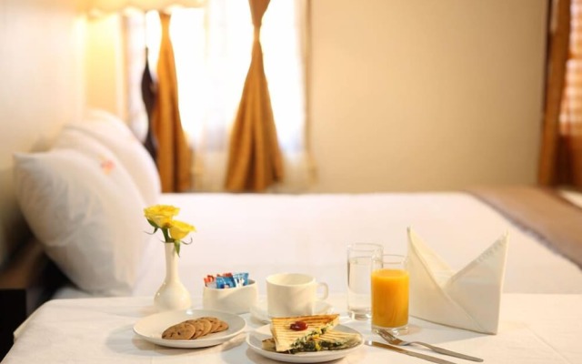 Meenakshi's Sunshine Hotel
