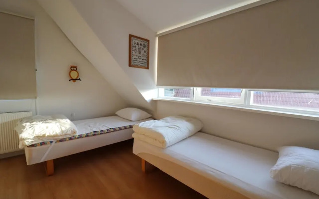 Nice Holiday Home on the Water in Grou