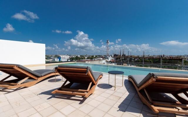 Riva 202 Playa del Carmen Condo Minutes from the Beach and 5th Avenue by RedAwning