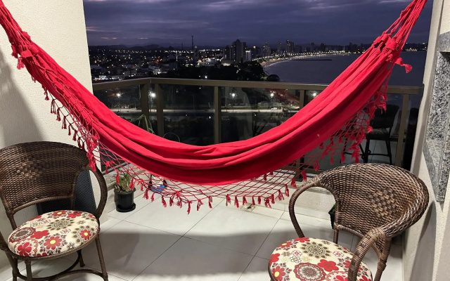 Apartamento novo frente mar com piscina aquecida em Home Club