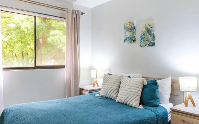 Cozy Condo with Panoramic Hillside Views from Rooftop Terrace and Short Walk to Beach