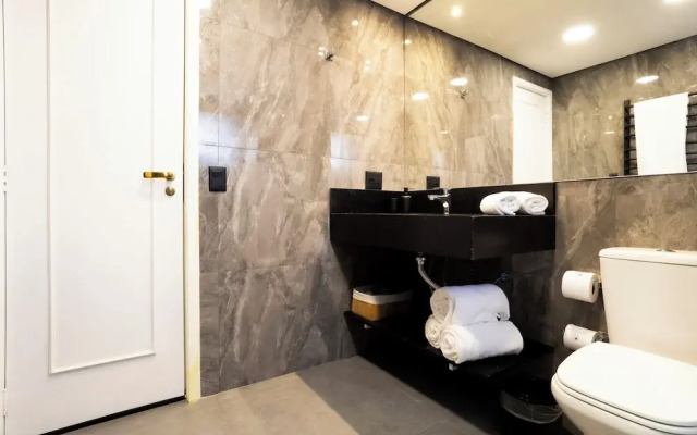 You Stay at Vila Olimpia - The World
