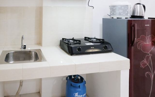 Homey 2Br At Puncak Permai Apartment