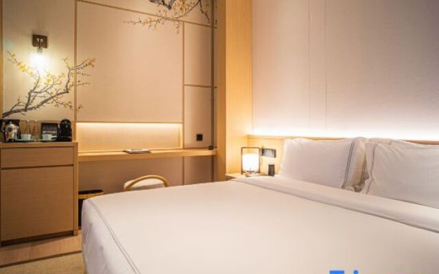 Zhoushan Green City Rose Garden Taoyuanli Hotel