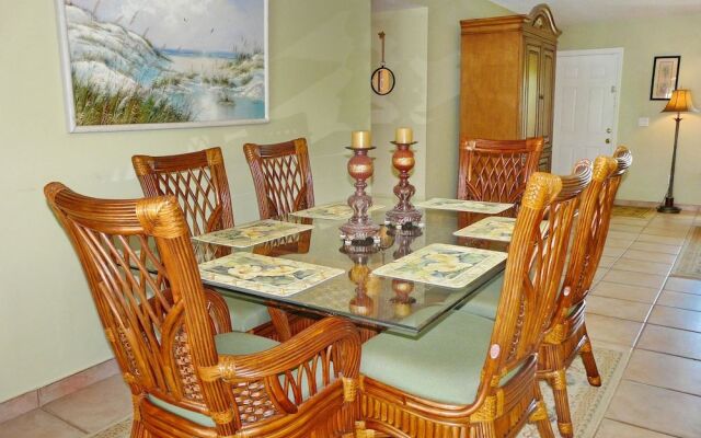 Cozy Home With Sunroom, Pool and Steps to Beach