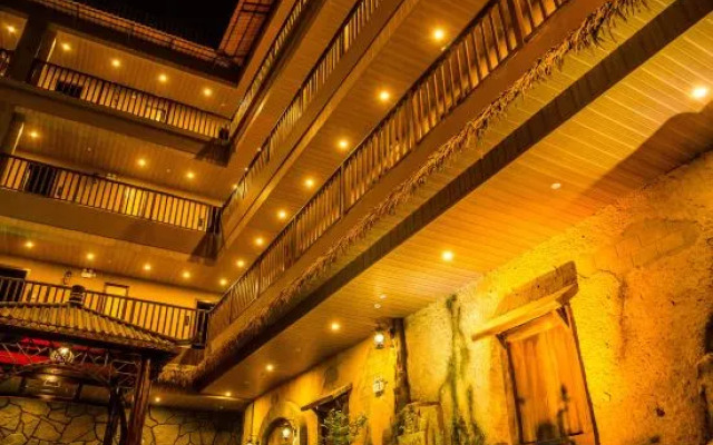 Muchun Inn (Xishuangbanna Poshui Square)