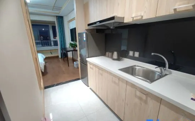 Muhai Lvsu Seaview Apartment (Development Zone Shibeiwan Water Park Branch)