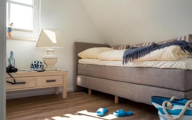 Ferienhaus Schilfrohrsaenger 61