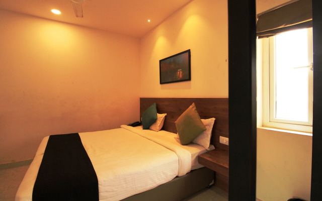 Capital O 18266 Hotel Arunaa Inn