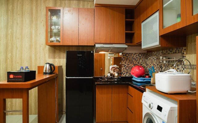 2BR Apartment with Sofa Bed at Woodland Park Residence By Travelio