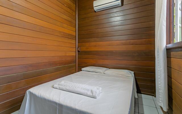 Casa c/ área verde e perto da praia LDS173