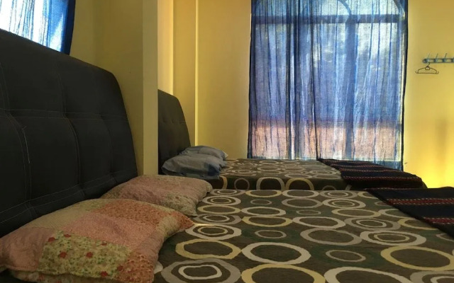 SPOT ON 89857 Azra Inn Rumah Tumpangan