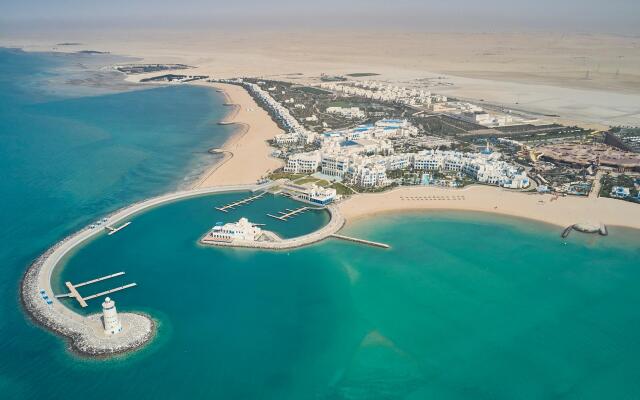 Hilton Salwa Beach Resort & Villas