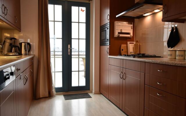 Exclusive Holiday Home Floating on a Lake in Friesland