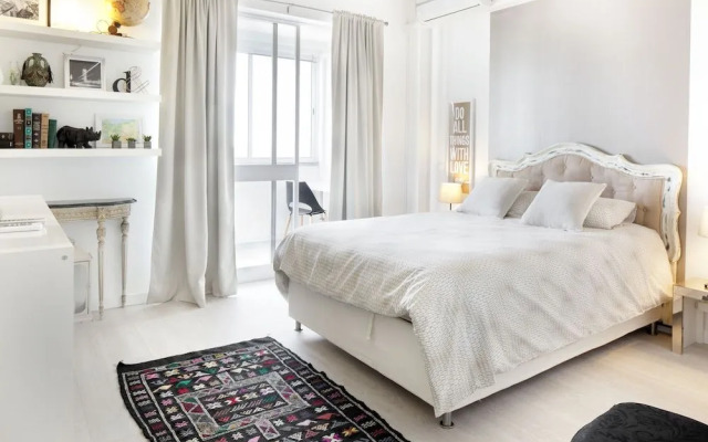 Prime Apartments White and Yellow