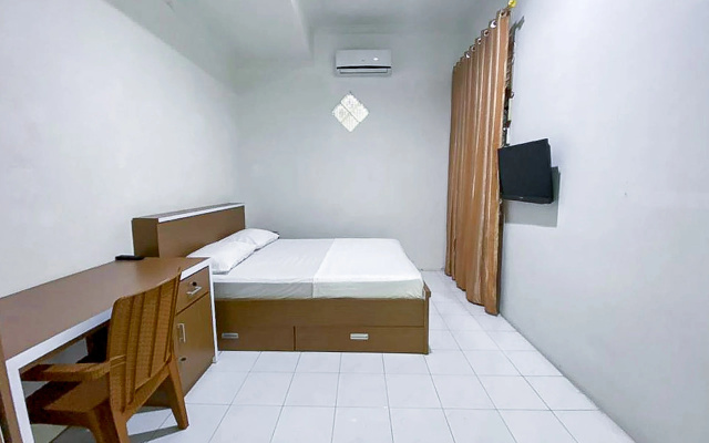 Damigalova Guest House RedPartner – Guest Rooms – Jambi