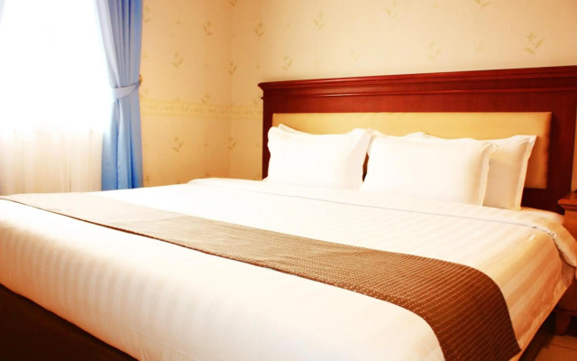 Travellers Suites Serviced Apartments