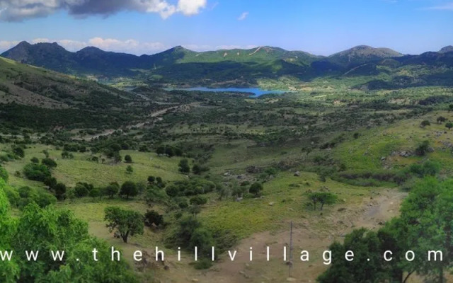 The Hill Village House