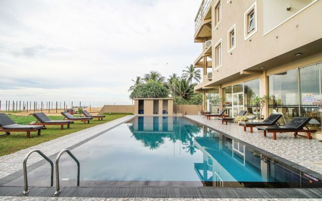Capital O 311 Grace Beach Resort