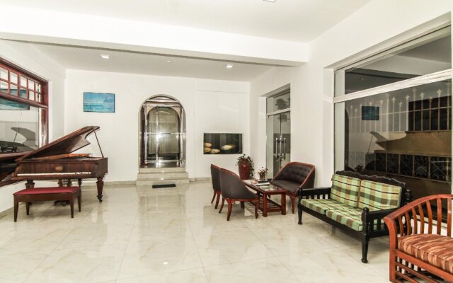 Qi Mag Apartments by OYO