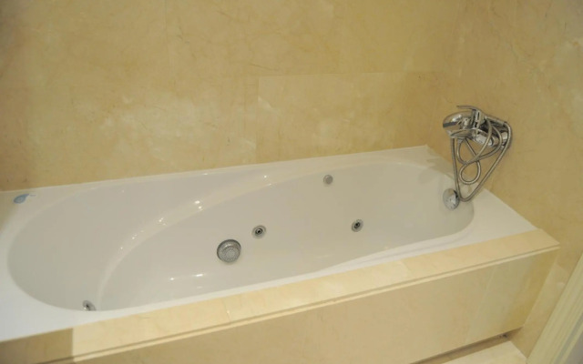 Precioso apartamento con jardín y piscina comunitaria