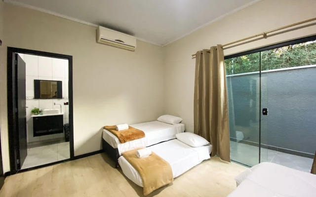 Casa Central piscina e AC para 8 hospede